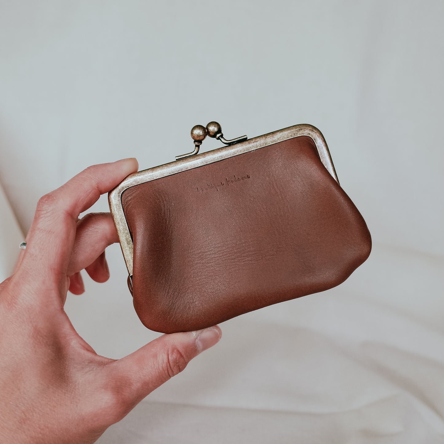 Coin purse with clasp